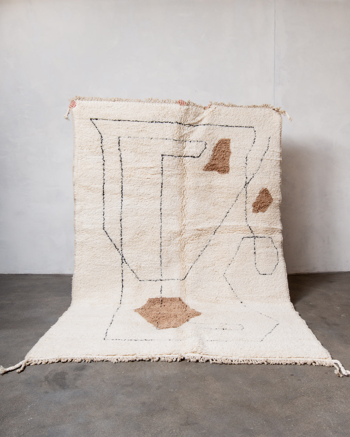 Modern, designer, handcrafted Berber rug from Morocco. Beniourain carpet with beautiful colours and patterns and fluffy wool texture.